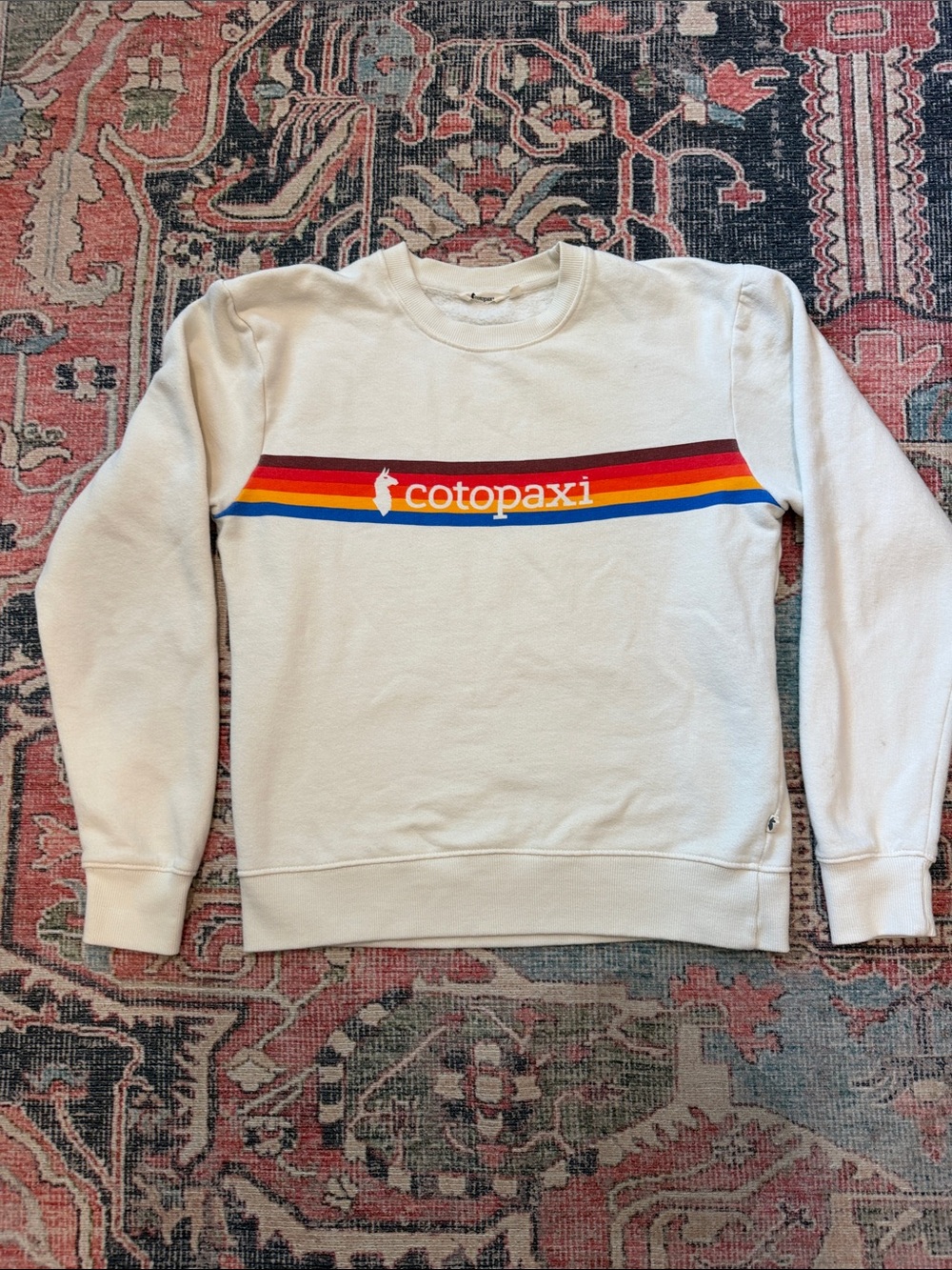 Cotopaxi Cream Crewneck Sweatshirt with Rainbow Chest Stripe Size small